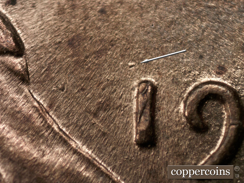 Die-stage C marker on 1944P•1DR•002 (1944 Doubled Die Reverse).