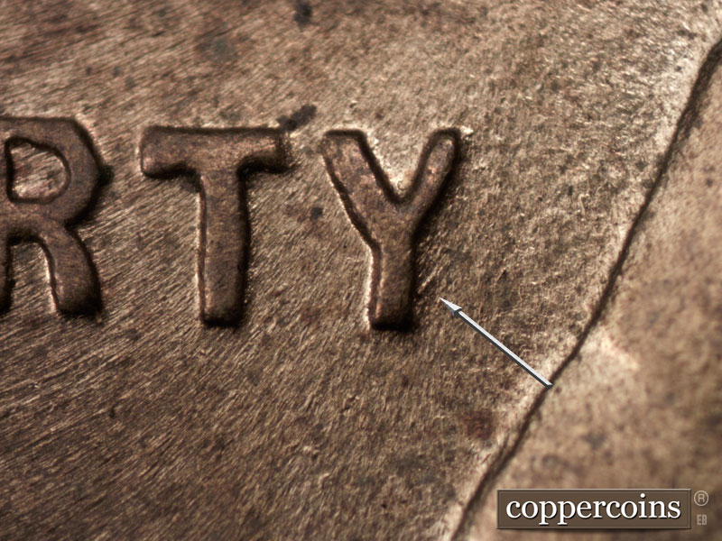 Die-stage C marker on 1944P•1DR•002 (1944 Doubled Die Reverse).