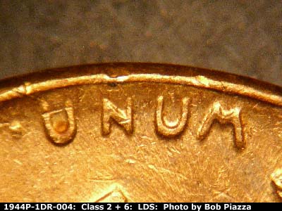 Die-stage C marker on 1944P•1DR•004 (1944 Doubled Die Reverse).