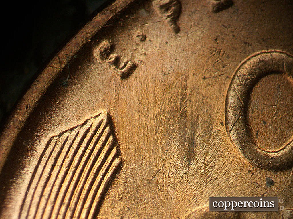 Die-stage B marker on 1944P•1DR•010 showing Mild extra thickness on E PLURIBUS UNUM an left wheat tip.