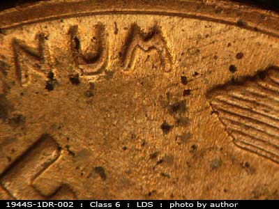Die-stage C marker on 1944S•1DR•002 (1944 Doubled Die Reverse).