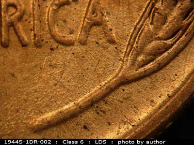 Die-stage C marker on 1944S•1DR•002 (1944 Doubled Die Reverse).