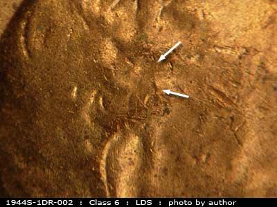 Die-stage C marker on 1944S•1DR•002 (1944 Doubled Die Reverse).