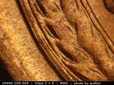 Die-stage B marker on 1944S•1DR•004 (1944 Doubled Die Reverse).