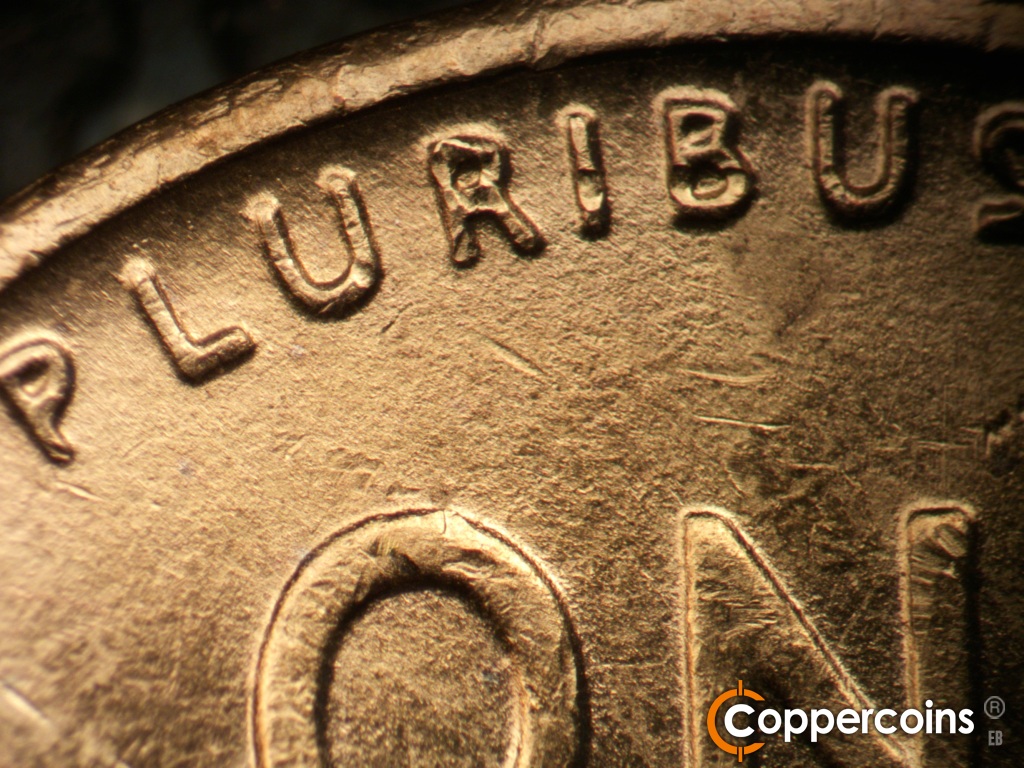 Die-stage B marker on 1944S•1DR•007 showing Light extra thickness on PLURIBUS.