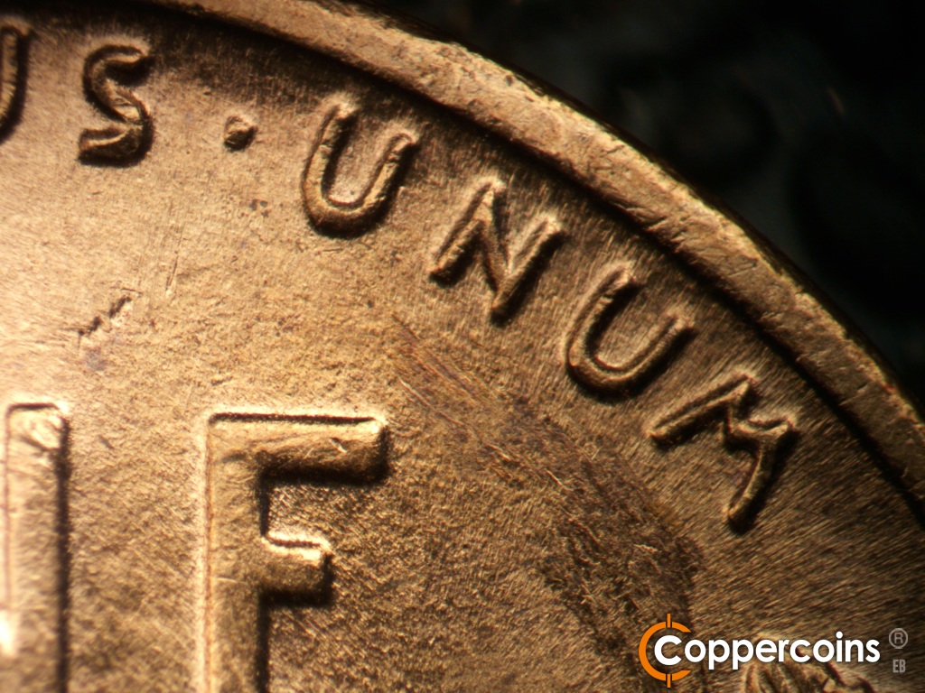 Die-stage B marker on 1944S•1DR•007 showing Light extra thickness on UNUM.