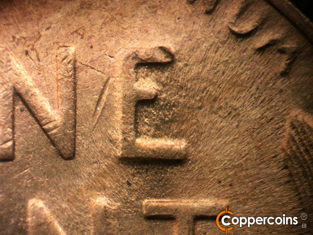 Die-stage C marker on 1944S•1MM•004 showing Excess die wear through E in ONE.