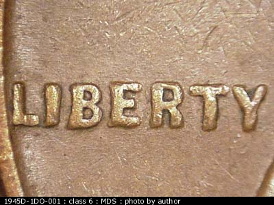 Die-stage B marker on 1945D•1DO•001 (1945 Doubled Die Obverse).