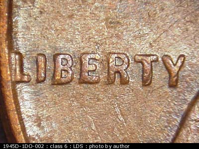 Die-stage C marker on 1945D•1DO•002 (1945 Doubled Die Obverse).