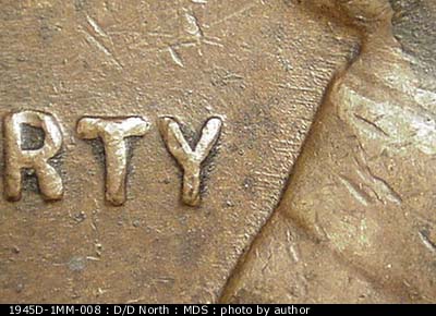 Die-stage B marker on 1945D•1MM•008 (1945 Repunched Mint Mark).