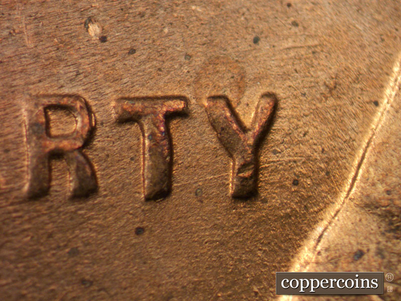 Die-stage B marker on 1945P•1DO•001 (1945 Doubled Die Obverse).
