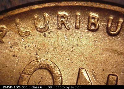 Die-stage C marker on 1945P•1DO•001 (1945 Doubled Die Obverse).