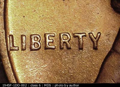 Die-stage B marker on 1945P•1DO•002 (1945 Doubled Die Obverse).