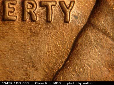 Die-stage B marker on 1945P•1DO•003 (1945 Doubled Die Obverse).