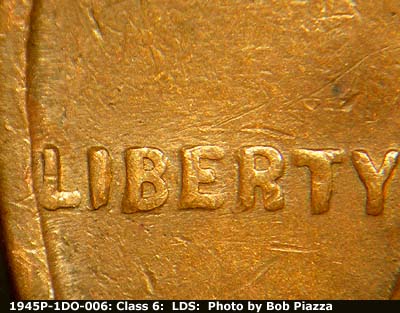 Die-stage B marker on 1945P•1DO•006 (1945 Doubled Die Obverse).