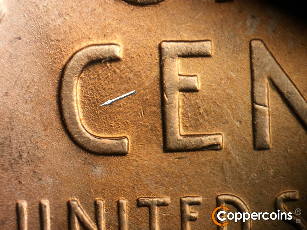 Die-stage B marker on 1945P•1DO•013 showing Light NNW die scratch in C of CENT.