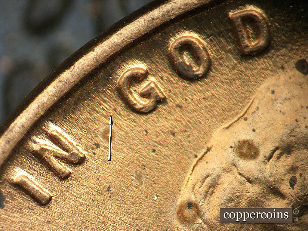 Die-stage B marker on 1945P•1DO•022 showing Die gouge near G in GOD.
