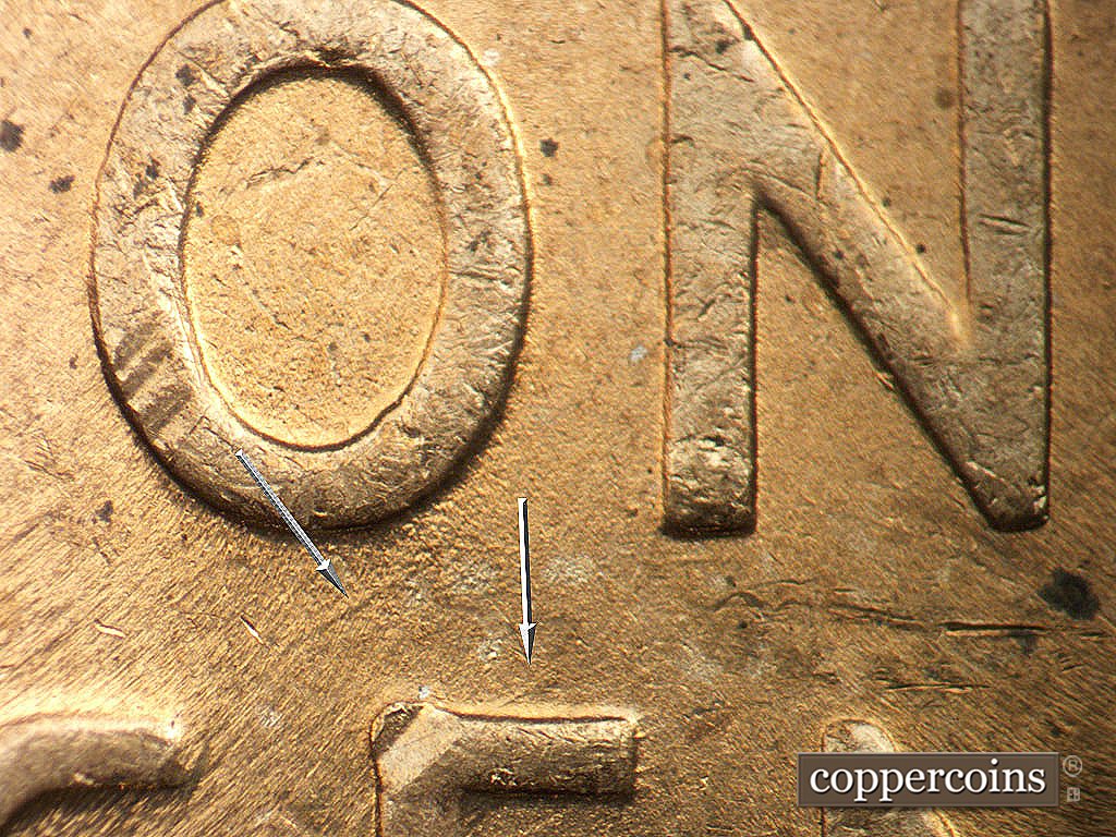 Die-stage B marker on 1945P•1DO•022 showing NE die scratches above CE in CENT.