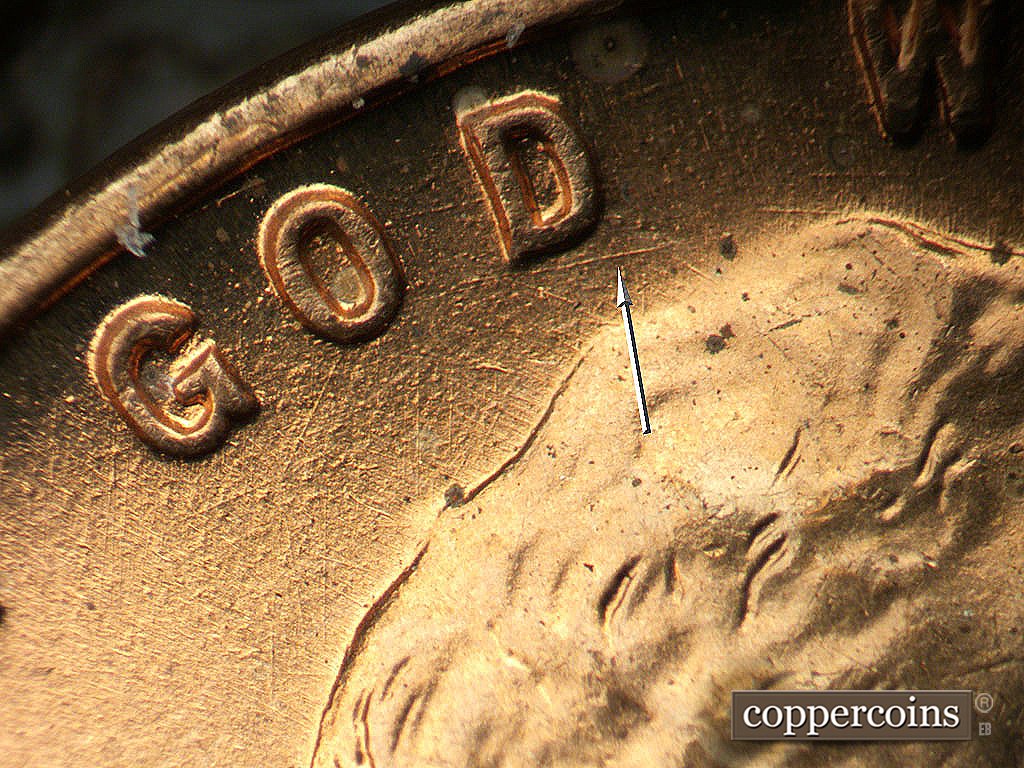 Die-stage A marker on 1945P•1DO•023 showing ENE die scratch under D in GOD.