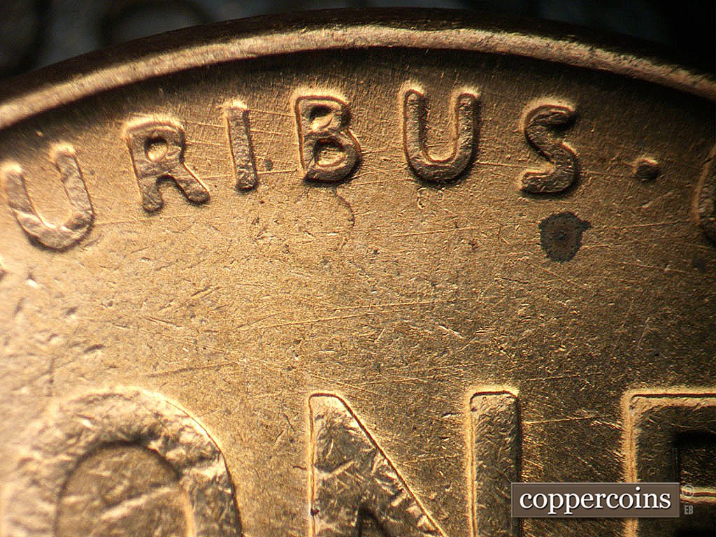 Die-stage A marker on 1945P•1DO•023 showing Die scratches through PLURIBUS.