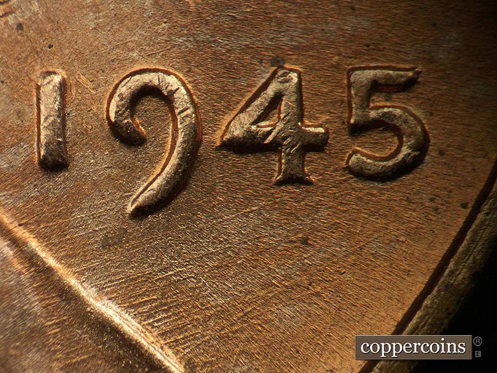 Die-stage B marker on 1945P•1DO•024 showing NE die scratches from lapel through date.