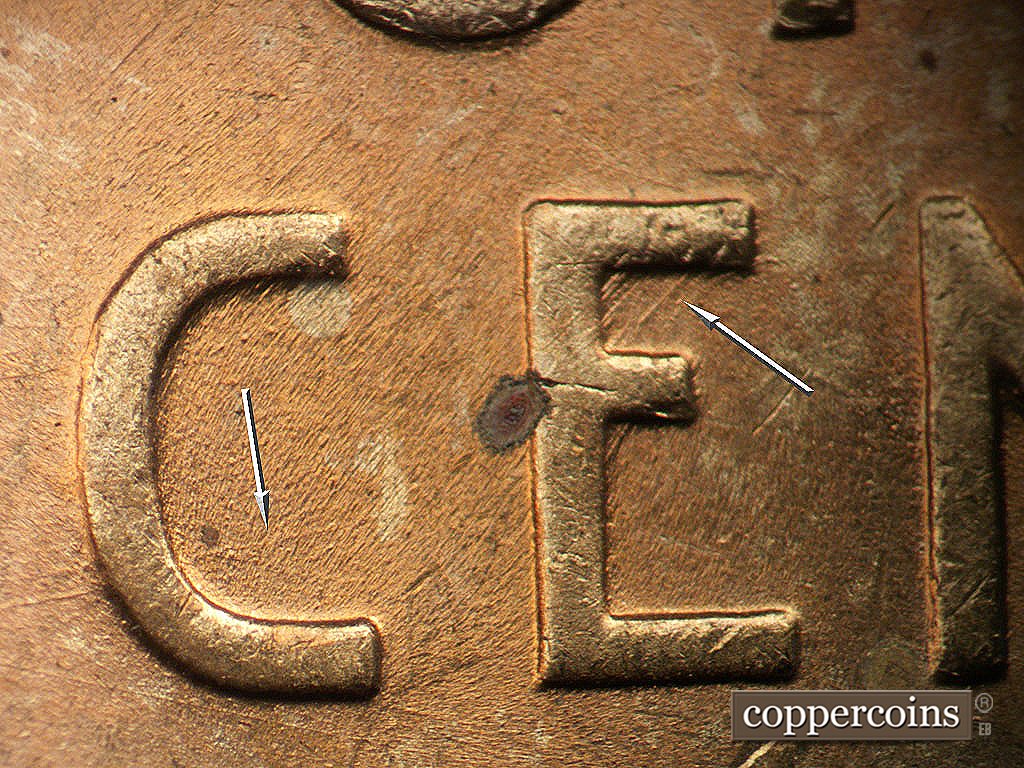 Die-stage B marker on 1945P•1DO•024 showing ENE die scratch through C in CENT. NE die scratches in upper E in CENT.