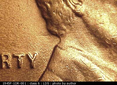 Die-stage C marker on 1945P•1DR•001 (1945 Doubled Die Reverse).