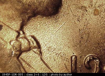 Die-stage C marker on 1945P•1DR•005 (1945 Doubled Die Reverse).