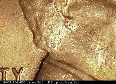 Die-stage C marker on 1945P•1DR•005 (1945 Doubled Die Reverse).