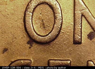 Die-stage B marker on 1945P•1DR•006 (1945 Doubled Die Reverse).