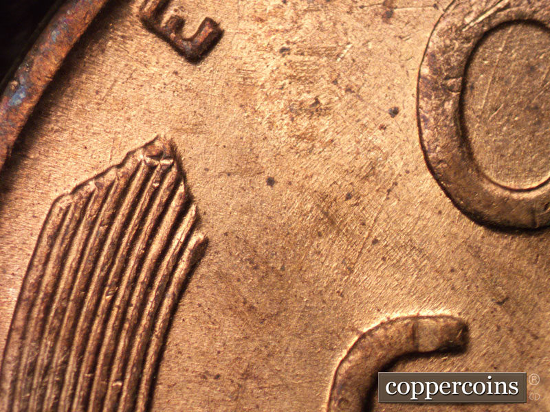 Die-stage B marker on 1945P•1DR•008 (1945 Doubled Die Reverse).