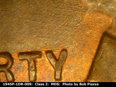 Die-stage B marker on 1945P•1DR•009 (1945 Doubled Die Reverse).