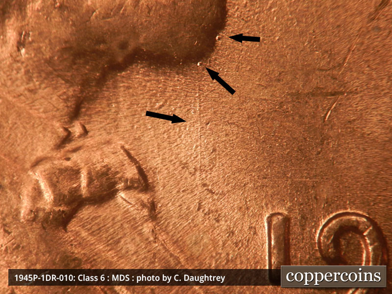Die-stage B marker on 1945P•1DR•010 (1945 Doubled Die Reverse).