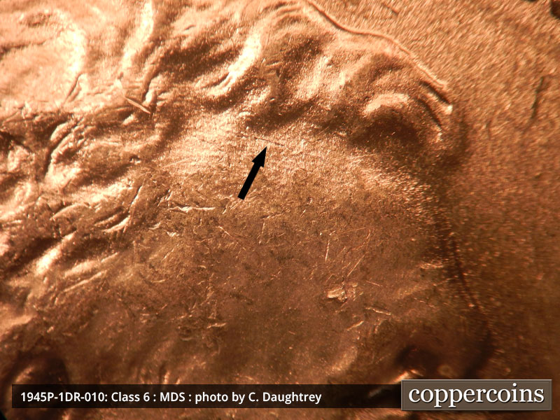 Die-stage B marker on 1945P•1DR•010 (1945 Doubled Die Reverse).