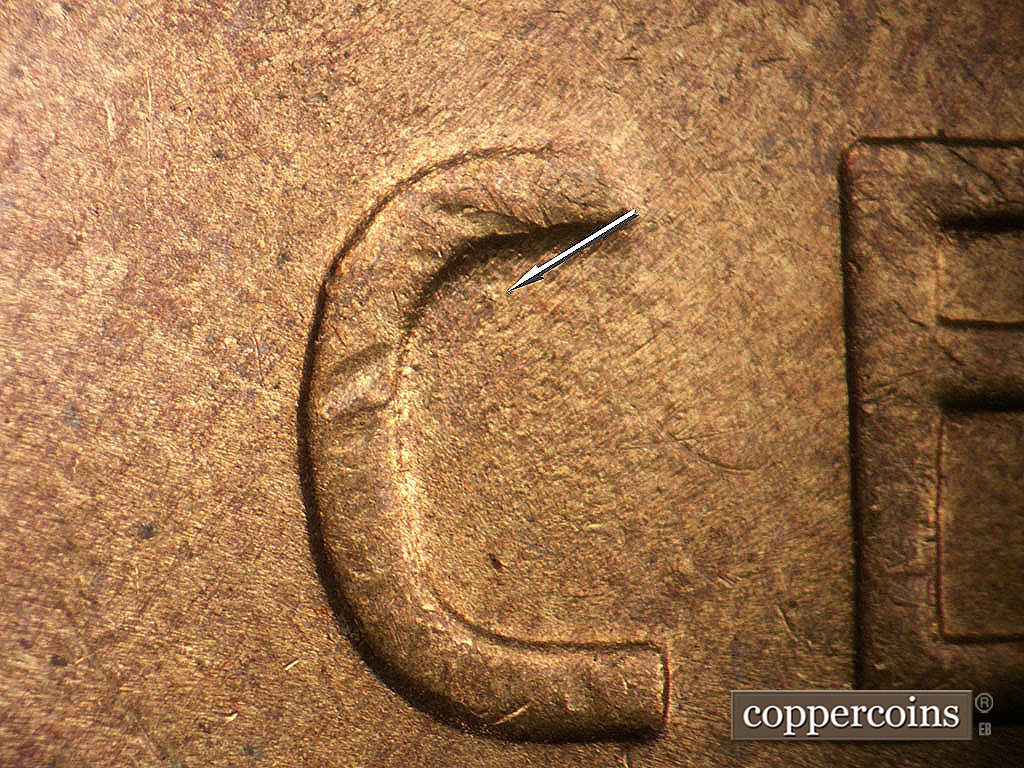Die-stage C marker on 1945S•1MM•032 showing Die gouge in C of CENT.