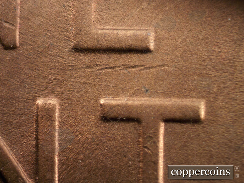 Die-stage B marker on 1946D•1MM•012 (1946 Repunched Mint Mark).