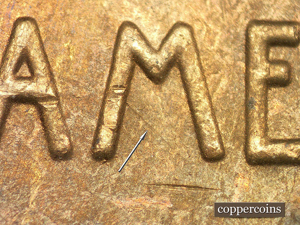 Die-stage C marker on 1946D•1MM•017 showing SE die scratch from inside of M in AMERICA.