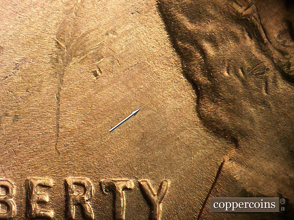 Die-stage B marker on 1946D•1MM•072 showing NW/SE die scratch behind hair above TY in LIBERTY.