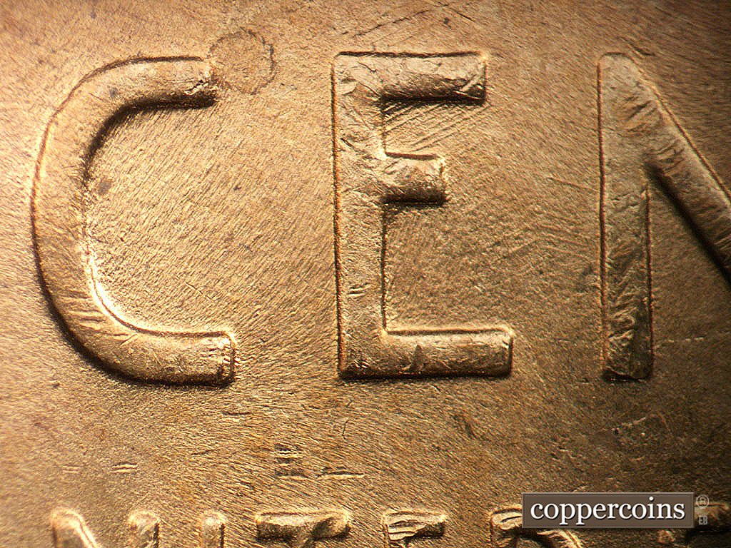 Die-stage B marker on 1946D•1MM•072 showing NE die scratches in upper E of CENT.