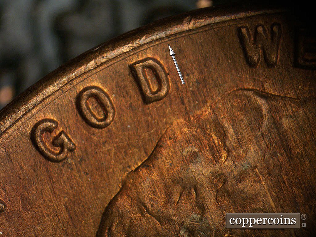 Die-stage B marker on 1946D•1MM•073 showing Concentric die scratch between rim and GOD.