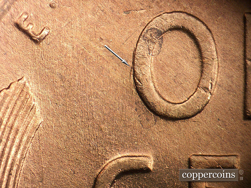 Die-stage A marker on 1946D•1MM•076 showing Die gouge from side of O in ONE.