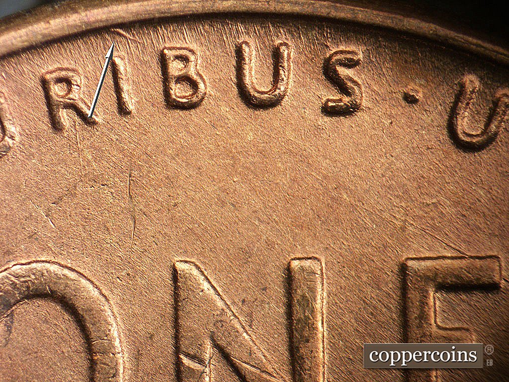 Die-stage A marker on 1946D•1MM•076 showing Die gouge from rim above IB in PLURIBUS.