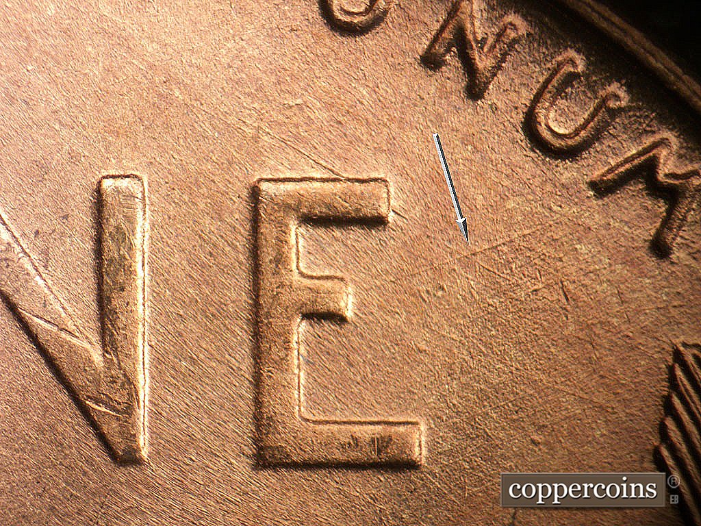 Die-stage A marker on 1946D•1MM•076 showing Die scratches form an X next to E in ONE.