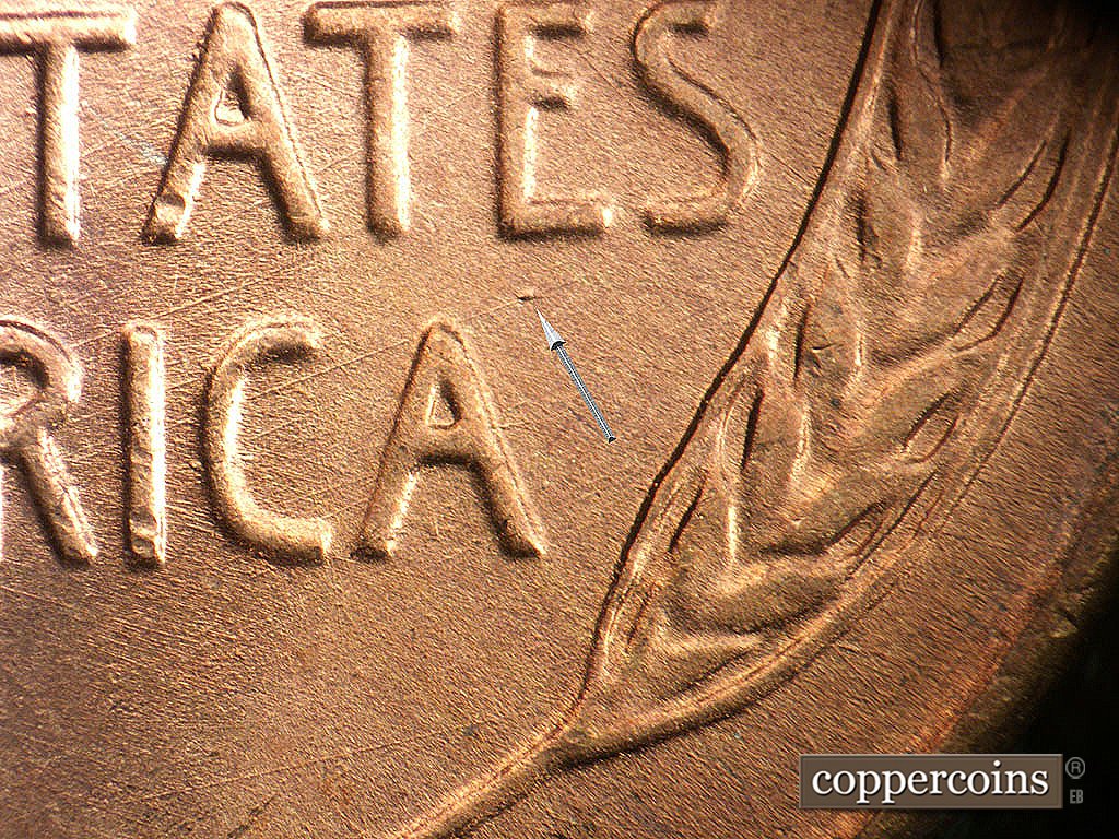 Die-stage A marker on 1946D•1MM•076 showing Die dot under E in STATES, Die scratches through STATES and AMERICA.