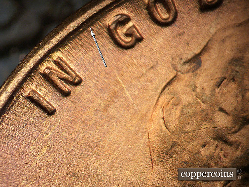 Die-stage B marker on 1946D•1MM•077 showing Concentric die gouge between rim and IN GOD.