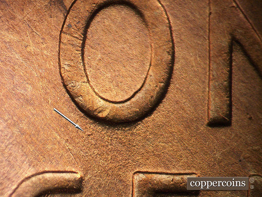 Die-stage B marker on 1946D•1MM•077 showing Die dot under O in ONE.