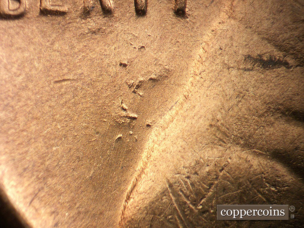 Die-stage B marker on 1946D•1MM•078 showing Die damage in field under TY in LIBERTY.