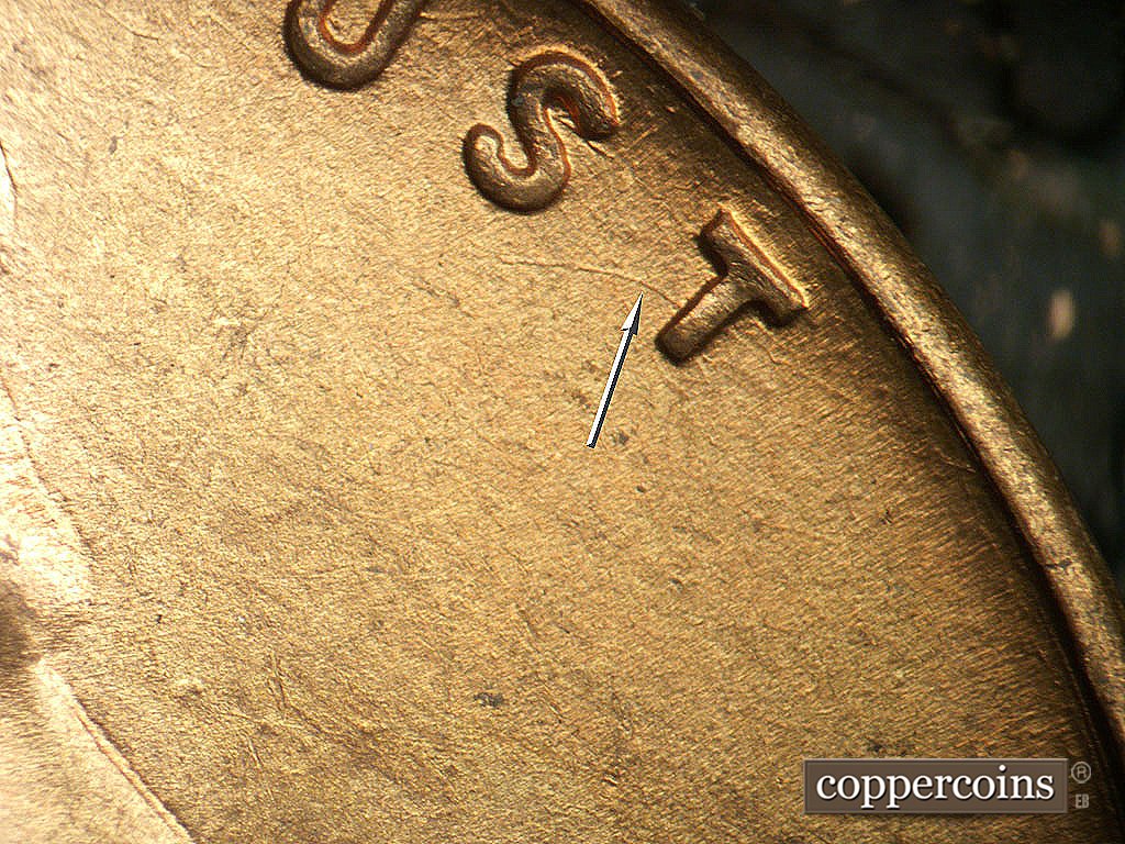 Die-stage B marker on 1946D•1MM•079 showing Unique die scratch through last T in TRUST.