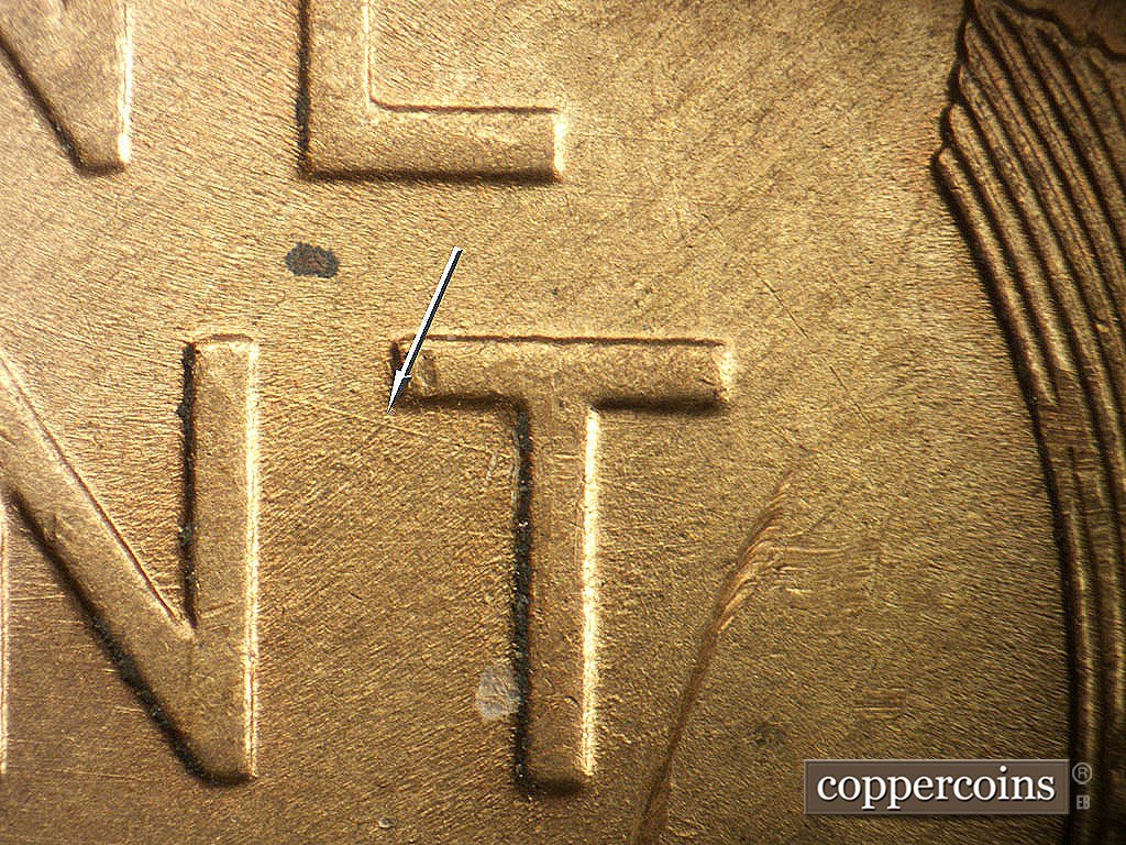Die-stage B marker on 1946D•1MM•079 showing ESE die scratch from N to T in CENT.