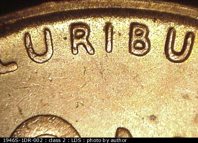 Die-stage C marker on 1946S•1DR•002 (1946 Doubled Die Reverse).